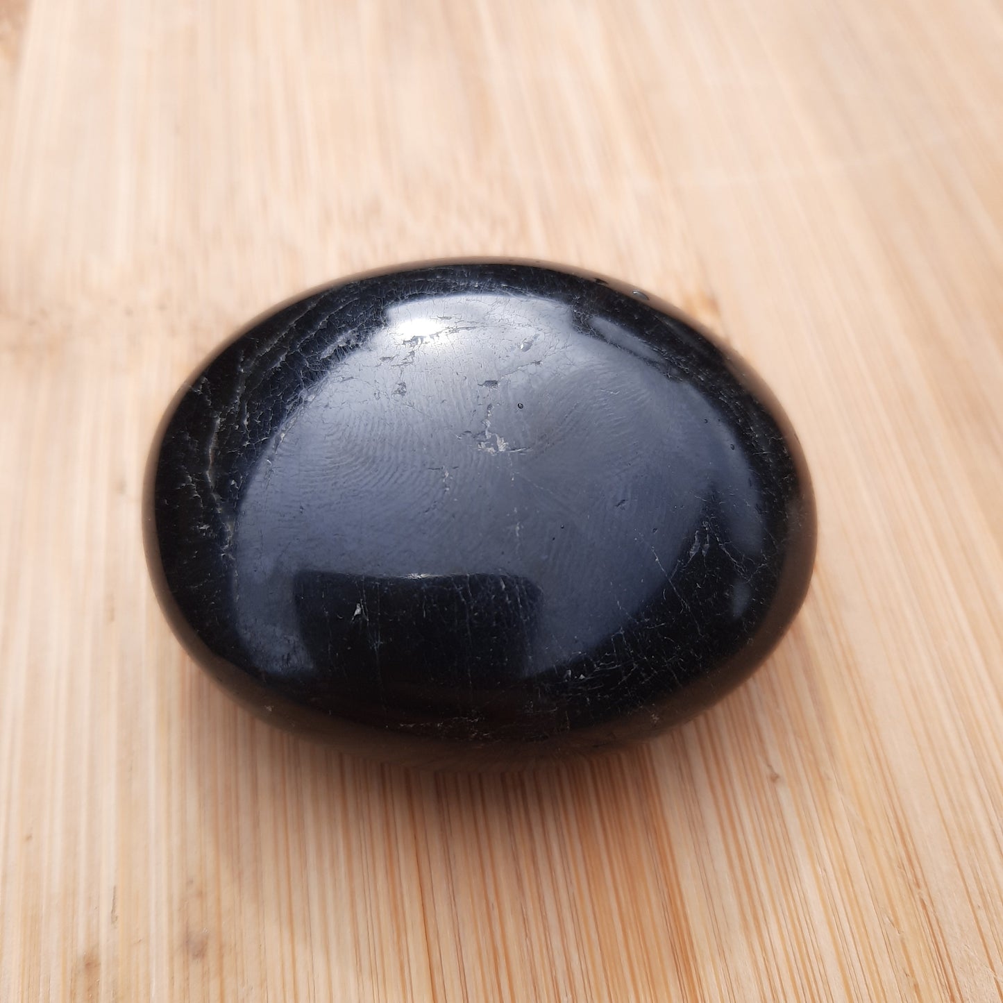 Black Tourmaline Palm Stones - The Crystal Society Pty Ltd