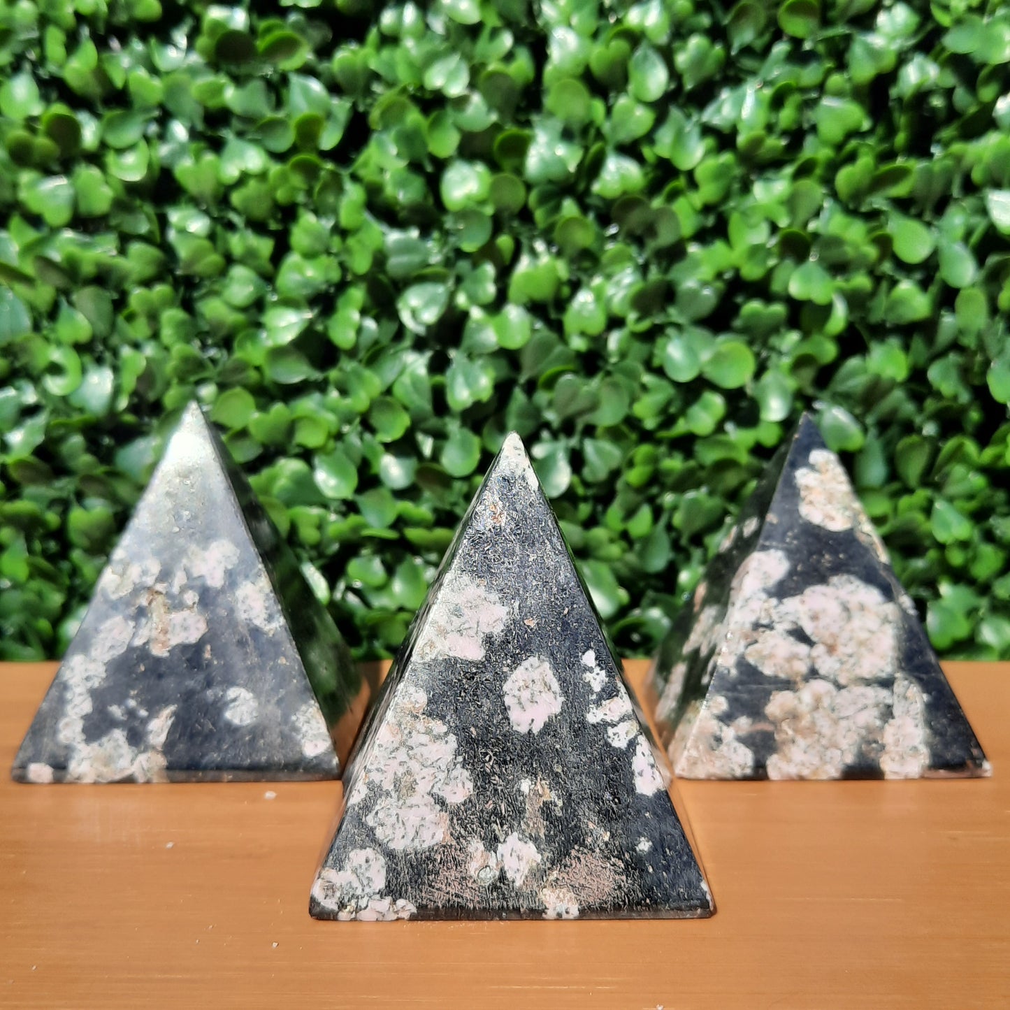 Pink Thulite In Black Jade Pyramids