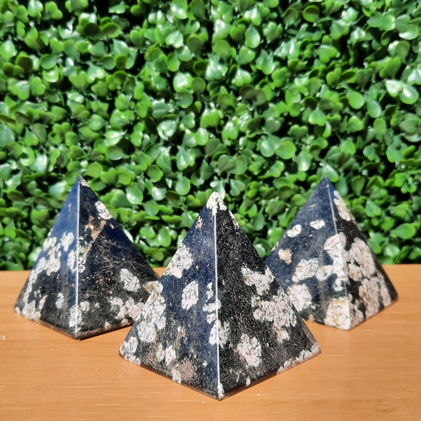 Pink Thulite In Black Jade Pyramids