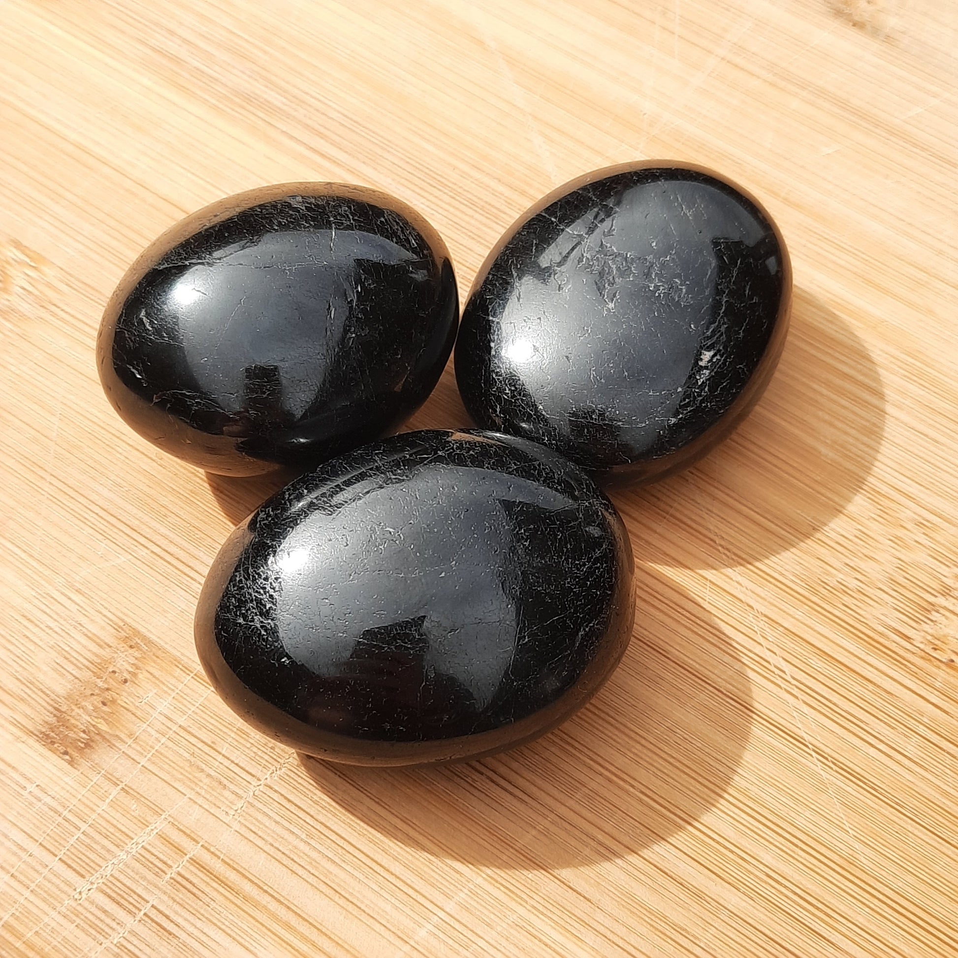 Black Tourmaline Palm Stones - The Crystal Society Pty Ltd